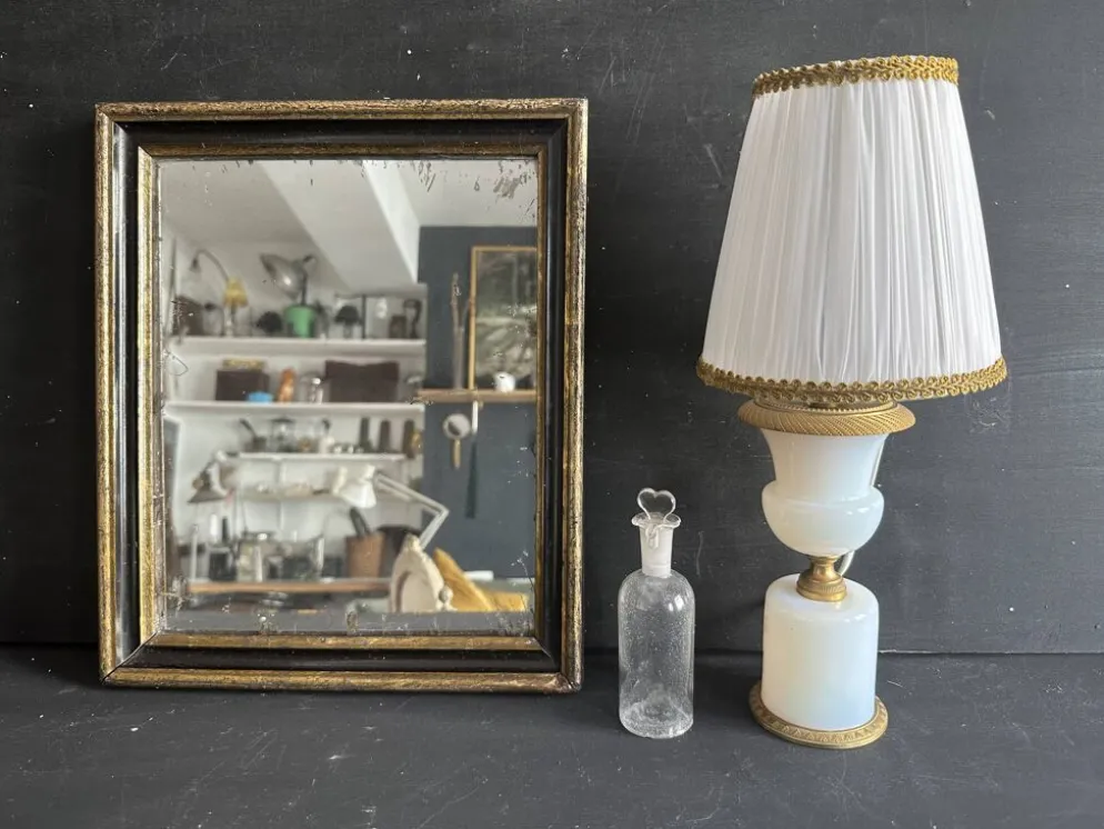 Miroir Napoléon III en bois noir et doré, XIXe siècle