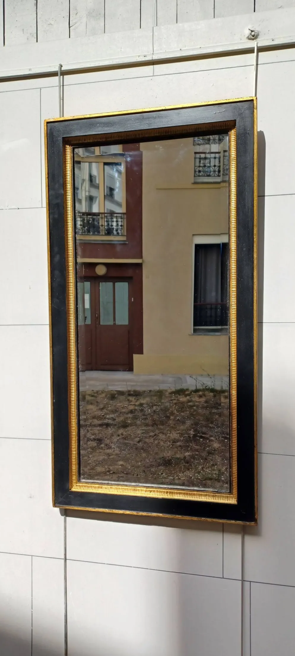 Miroir noir et dore de style art deco
