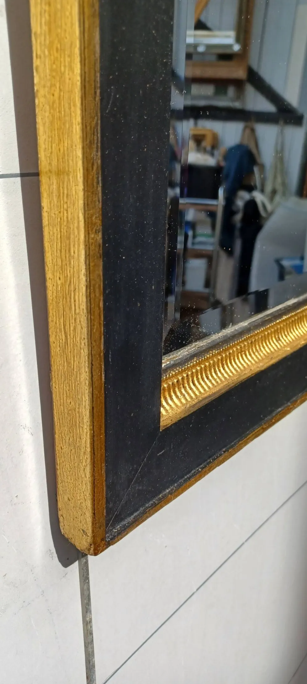 Miroir noir et dore de style art deco
