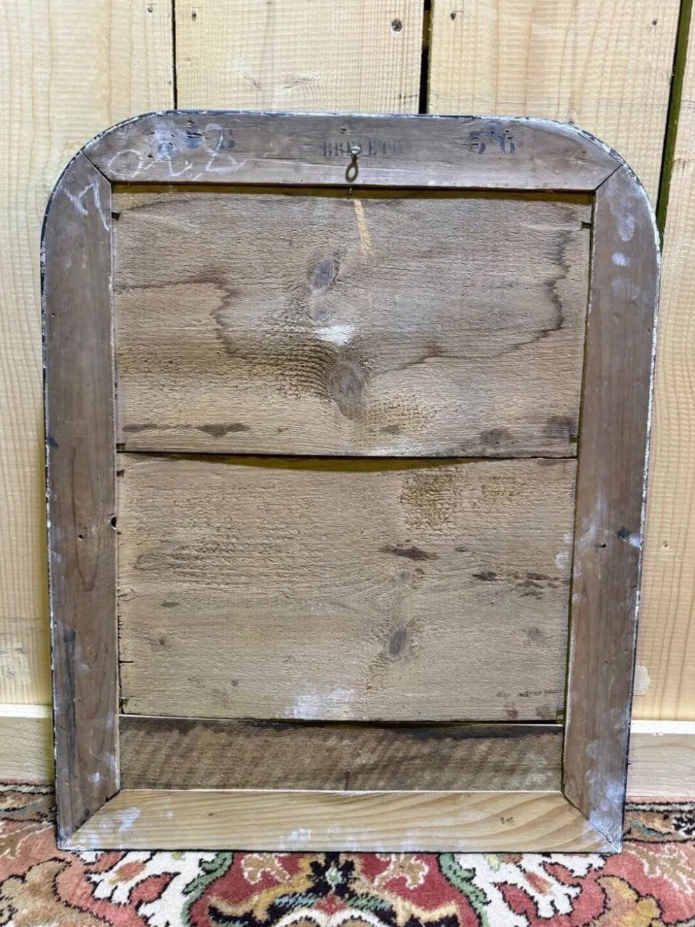 Miroir octogonal biseauté – Époque 1900 – Cadre bois teinté acajou