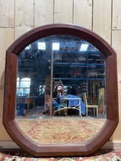 Miroir octogonal biseauté – Époque 1900 – Cadre bois teinté acajou