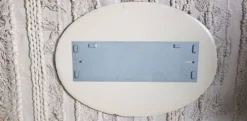 Miroir oval art deco un fond miroir fumé et un miroir par dessus biseauté 58x81cm