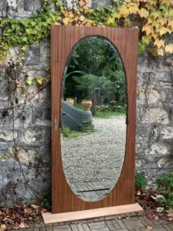 Miroir oval biseauté sur porte art déco Acajou 79x162