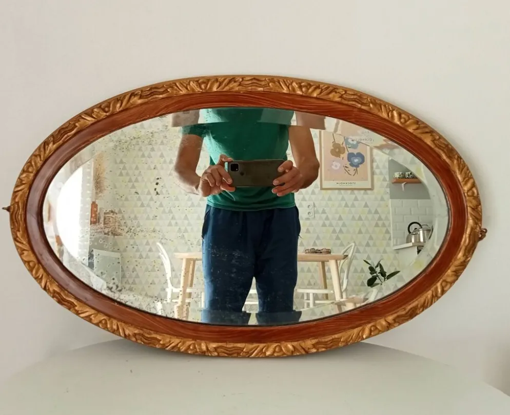 Miroir ovale ancien glace biseauté en bois et stuc XIXeme