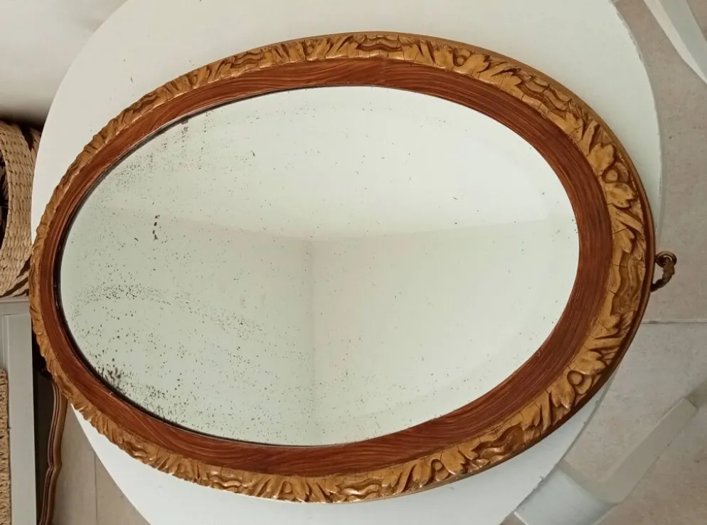 Miroir ovale ancien glace biseauté en bois et stuc XIXeme