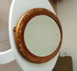 Miroir ovale ancien glace biseauté en bois et stuc XIXeme