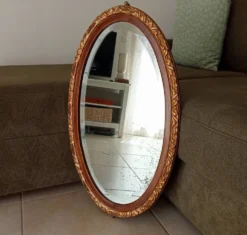 Miroir ovale ancien glace biseauté en bois et stuc XIXeme