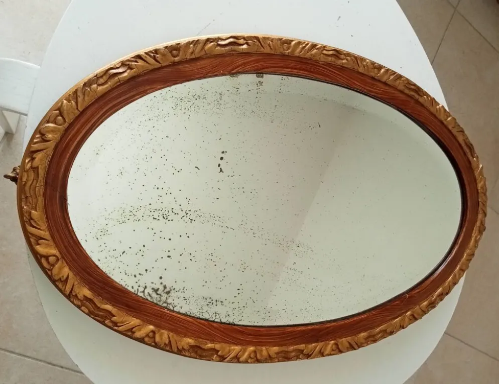 Miroir ovale ancien glace biseauté en bois et stuc XIXeme