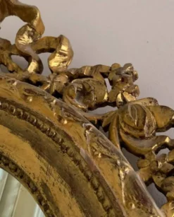 Miroir ovale ancien à la feuille d'or – Fronton nœud & motifs floraux style