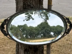 Miroir ovale biseauté art déco fer forgé richement travaillé