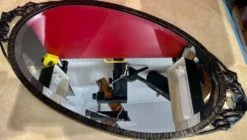 Miroir ovale biseauté art déco fer forgé richement travaillé