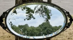 Miroir ovale biseauté art déco fer forgé richement travaillé