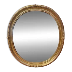 Miroir ovale biseauté bois doré style Louis XVI XIXe siècle