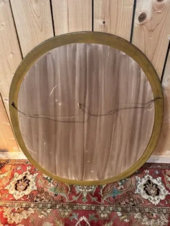 Miroir ovale biseauté bois doré style Louis XVI XIXe siècle