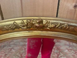 Miroir ovale biseauté bois doré style Louis XVI XIXe siècle