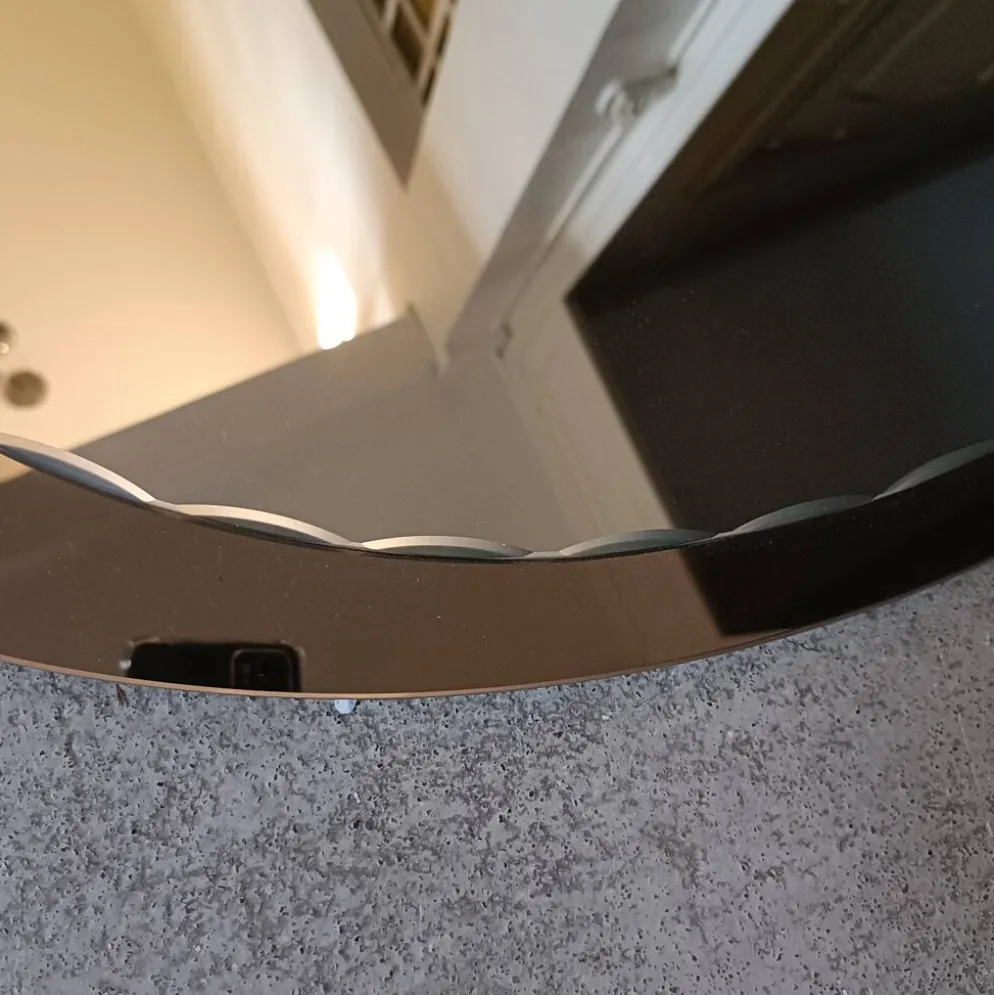 Miroir ovale biseauté seventies