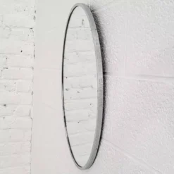 Miroir ovale des années 60 sur contour chromé