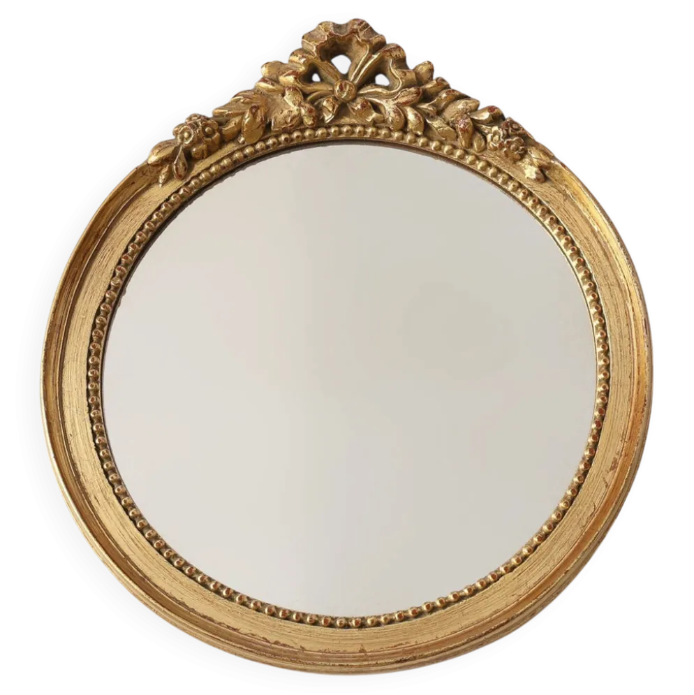 Miroir ovale en bois doré avec un fronton floral de style rococo, milieu du 20e siècle