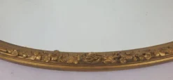 Miroir ovale en bois doré, style Louis XVI