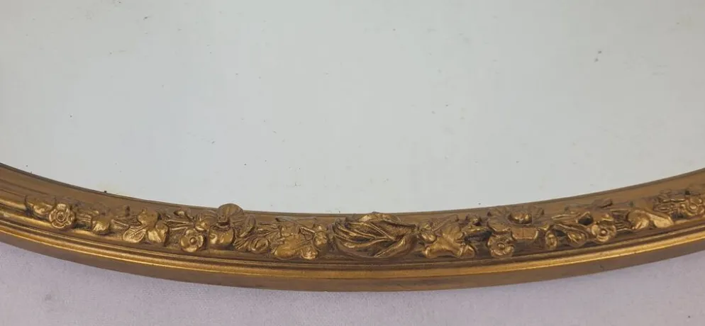 Miroir ovale en bois doré, style Louis XVI