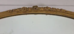 Miroir ovale en bois doré, style Louis XVI