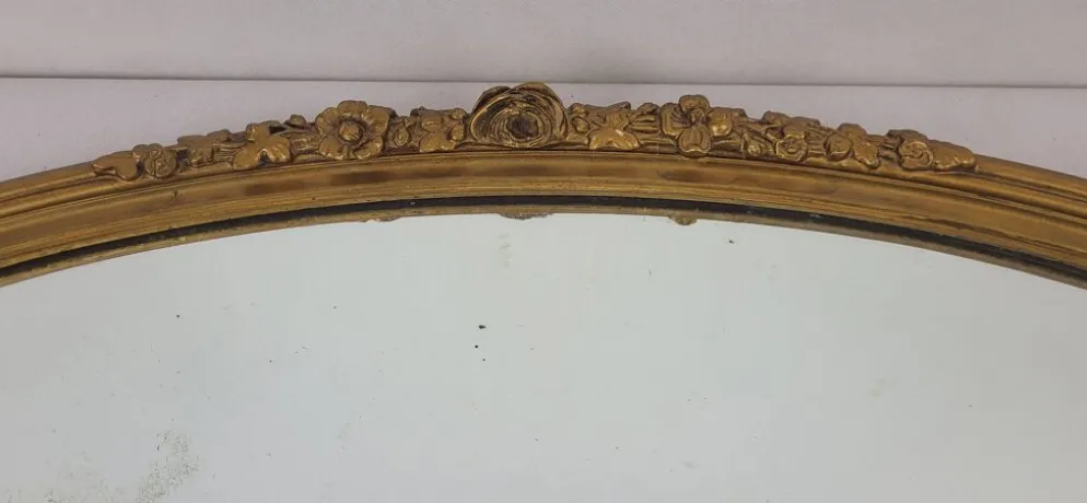 Miroir ovale en bois doré, style Louis XVI