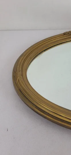 Miroir ovale en bois doré, style Louis XVI