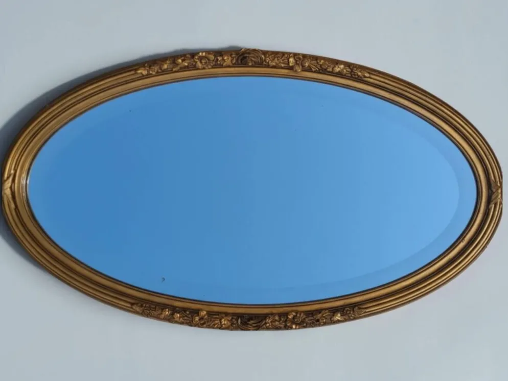 Miroir ovale en bois doré, style Louis XVI