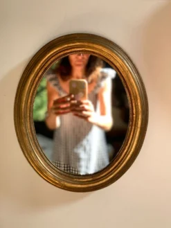 Miroir ovale en bois doré, style Napoléon III