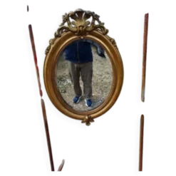 Miroir ovale en bois et stuc doré 19ème