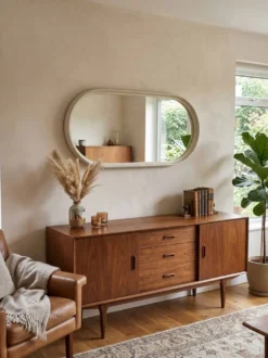 Miroir ovale en laqué blanc des années 70