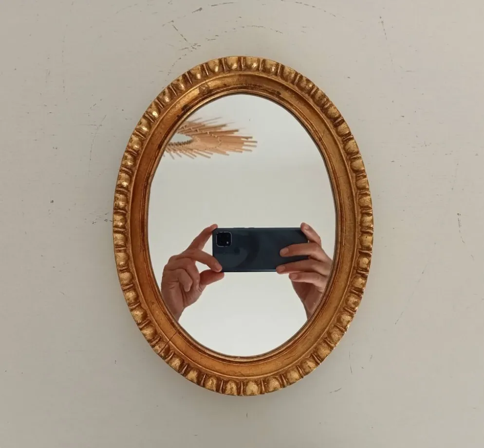 Miroir ovale italien vintage en bois doré