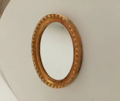 Miroir ovale italien vintage en bois doré