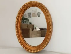 Miroir ovale italien vintage en bois doré