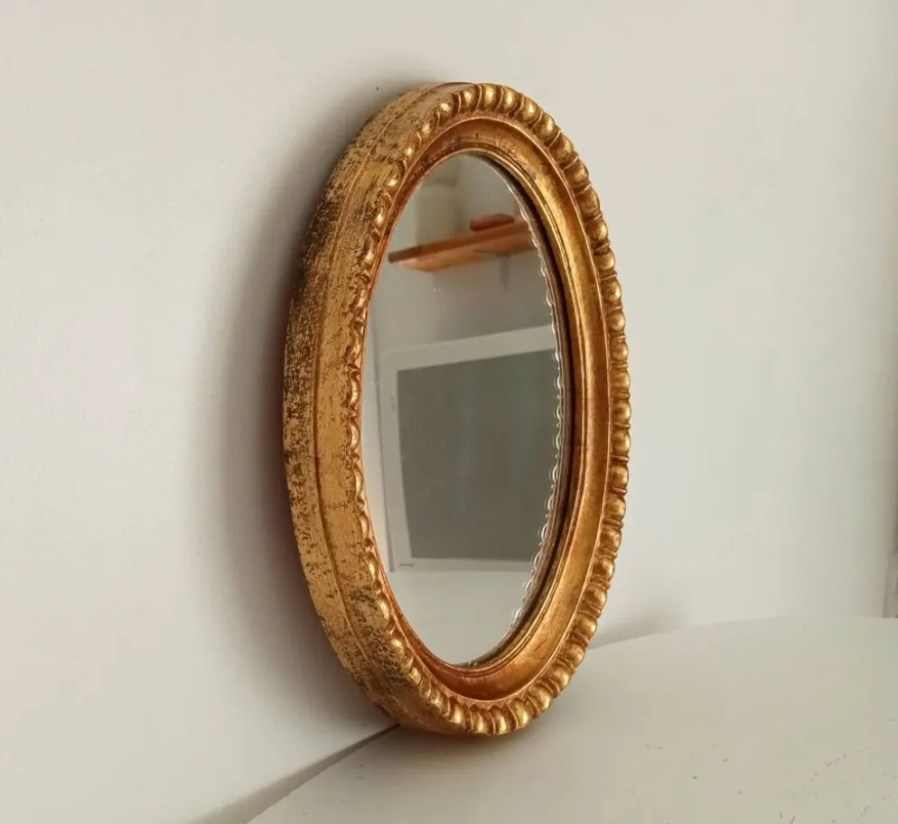 Miroir ovale italien vintage en bois doré