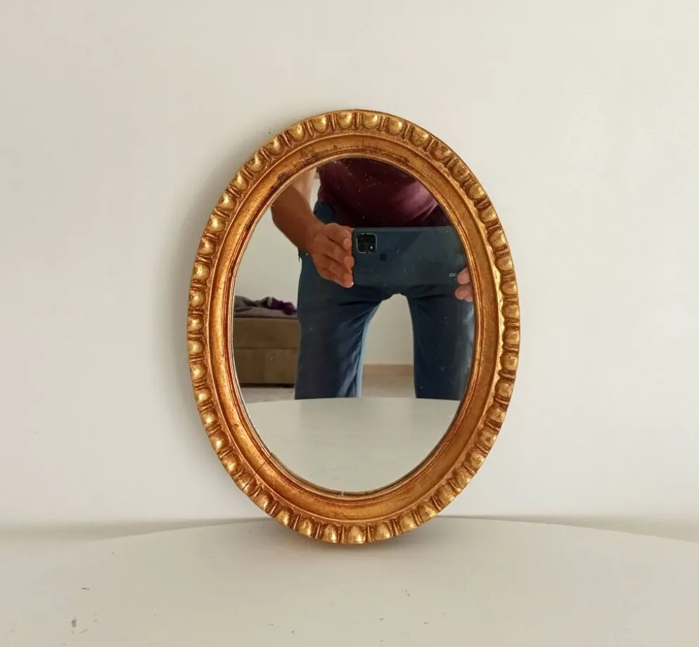 Miroir ovale italien vintage en bois doré