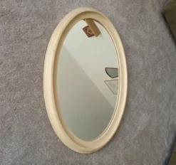 Miroir ovale vintage en bois patiné