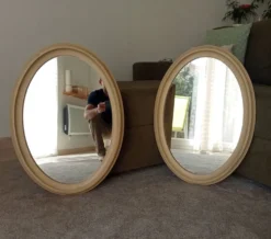 Miroir ovale vintage en bois patiné