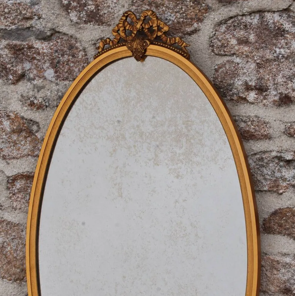 Miroir ovale vintage en métal doré à nœud – style Louis XVI / romantique