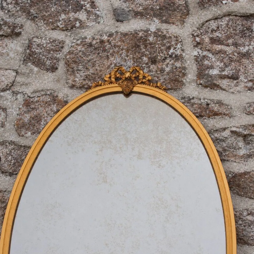 Miroir ovale vintage en métal doré à nœud – style Louis XVI / romantique