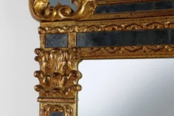 Miroir rococo-vénitien belge du XXe siècle en bois doré