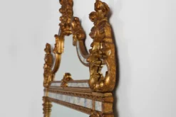Miroir rococo-vénitien belge du XXe siècle en bois doré