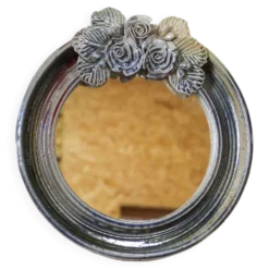 Miroir rond en céramique à décor de fleurs par Catido