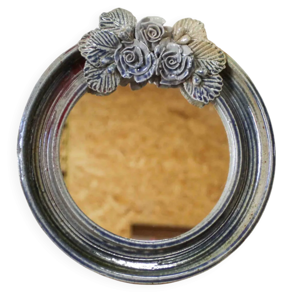 Miroir rond en céramique à décor de fleurs par Catido