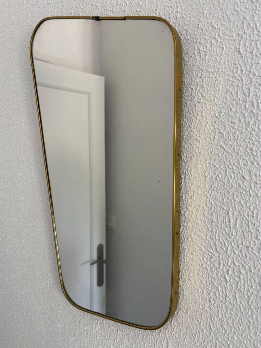 Miroir rétroviseur asymétrique, 1960