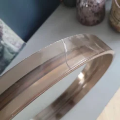 Miroir 70’s en plastique fumé