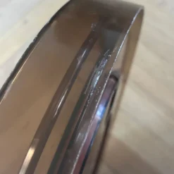 Miroir 70’s en plastique fumé
