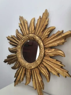 Miroir soleil doré