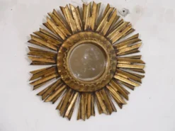 Miroir soleil en bois doré 1950
