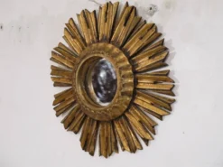 Miroir soleil en bois doré 1950